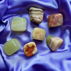 Shop Tumbled Onyx Crystals & Pocket Stones! green onyx tumble | polished green onyx | tumbled green onyx | natural green onyx | Natural genuine stones & crystals in various shapes & sizes. Buy raw cut, tumbled, or polished gemstones for making jewelry or crystal healing energy vibration raising reiki stones. #crystals #gemstones #crystalhealing #crystalsandgemstones #energyhealing #affiliate #ad