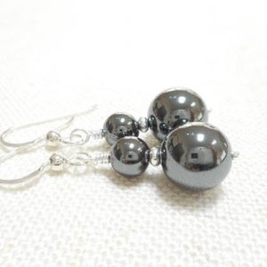 Shop Hematite Jewelry! Hematite Earrings, Silver and Gunmetal Gray Earrings, Grey Stone Beaded Drop Earrings, Hematite Jewelry, Dangle Earrings, Gift for Her | Natural genuine Hematite jewelry. Buy crystal jewelry, handmade handcrafted artisan jewelry for women.  Unique handmade gift ideas. #jewelry #beadedjewelry #beadedjewelry #gift #shopping #handmadejewelry #fashion #style #product #jewelry #affiliate #ad