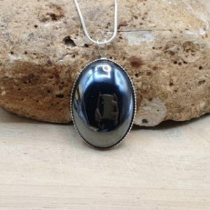 Simple oval Hematite pendant. 925 sterling silver necklaces for women. Reiki jewelry uk. Grey semi precious stone. 25x18mm stone | Natural genuine Hematite pendants. Buy crystal jewelry, handmade handcrafted artisan jewelry for women.  Unique handmade gift ideas. #jewelry #beadedpendants #beadedjewelry #gift #shopping #handmadejewelry #fashion #style #product #pendants #affiliate #ad