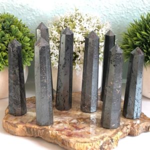 Shop Hematite Points & Wands! Hematite Tower | Natural genuine stones & crystals in various shapes & sizes. Buy raw cut, tumbled, or polished gemstones for making jewelry or crystal healing energy vibration raising reiki stones. #crystals #gemstones #crystalhealing #crystalsandgemstones #energyhealing #affiliate #ad