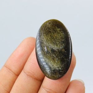 Shop Golden Obsidian Stones & Crystals! High Quality Golden Sheen Obsidian Cabochon, Wire Wrapping, Natural Golden Sheen Obsidian, Jewellery, Sheen Obsidian Cabochon, Loose Stone | Natural genuine stones & crystals in various shapes & sizes. Buy raw cut, tumbled, or polished gemstones for making jewelry or crystal healing energy vibration raising reiki stones. #crystals #gemstones #crystalhealing #crystalsandgemstones #energyhealing #affiliate #ad