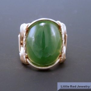 Shop Jade Rings! 14 k Gold Filled Nephrite Jade Cabochon Wire Wrapped Ring | Natural genuine Jade rings, simple unique handcrafted gemstone rings. #rings #jewelry #shopping #gift #handmade #fashion #style #affiliate #ad