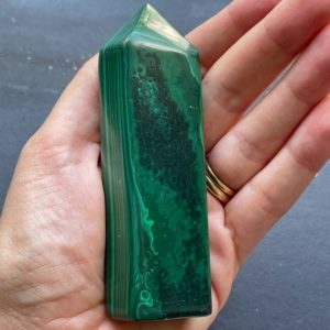 Shop Malachite Points & Wands! Malachite Crystal Tower Point – Polished | Natural genuine stones & crystals in various shapes & sizes. Buy raw cut, tumbled, or polished gemstones for making jewelry or crystal healing energy vibration raising reiki stones. #crystals #gemstones #crystalhealing #crystalsandgemstones #energyhealing #affiliate #ad