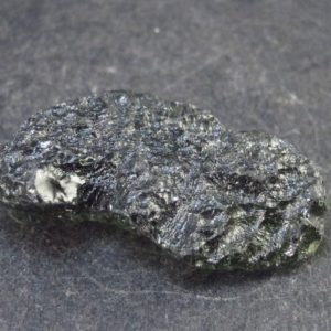 Shop Moldavite Stones & Crystals! Rare Moldavite Tektite Raw Piece From Czech Republic – 1.3" – 6.7 Grams | Natural genuine stones & crystals in various shapes & sizes. Buy raw cut, tumbled, or polished gemstones for making jewelry or crystal healing energy vibration raising reiki stones. #crystals #gemstones #crystalhealing #crystalsandgemstones #energyhealing #affiliate #ad