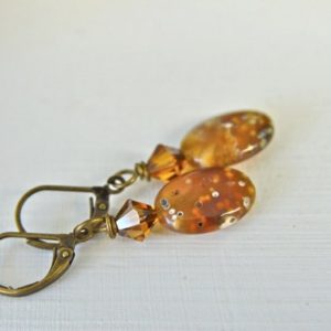 Shop Ocean Jasper Earrings! Natural Ocean Jasper Earrings with Rust and Gold Accents from North Atlantic Art Studio in Maine | Natural genuine Ocean Jasper earrings. Buy crystal jewelry, handmade handcrafted artisan jewelry for women.  Unique handmade gift ideas. #jewelry #beadedearrings #beadedjewelry #gift #shopping #handmadejewelry #fashion #style #product #earrings #affiliate #ad