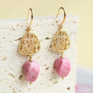 Shop Rhodonite Earrings! Natural Pink Rhodonite Earrings | Pink Gemstone Dangle Earrings with Gold Charm | Stone of Love Earrings | Natural genuine Rhodonite earrings. Buy crystal jewelry, handmade handcrafted artisan jewelry for women.  Unique handmade gift ideas. #jewelry #beadedearrings #beadedjewelry #gift #shopping #handmadejewelry #fashion #style #product #earrings #affiliate #ad