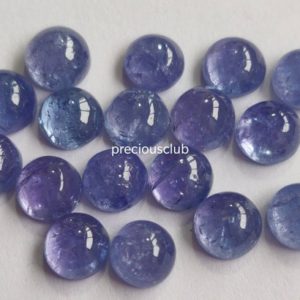 Shop Tanzanite Cabochons! Natural Tanzanite 7 mm Round Cabochon -Loose Tanzanite AA Quality | Natural genuine stones & crystals in various shapes & sizes. Buy raw cut, tumbled, or polished gemstones for making jewelry or crystal healing energy vibration raising reiki stones. #crystals #gemstones #crystalhealing #crystalsandgemstones #energyhealing #affiliate #ad