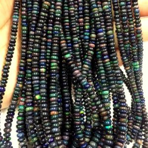 Shop Opal Rondelle Beads! SUPER FIRE OPAL–Natural Ethiopian Black Opal Smooth Rondelle Beads Fire Black Opal Smooth Gemstone Beads Jewelry Making Christmas sale | Natural genuine rondelle Opal beads for beading and jewelry making.  #jewelry #beads #beadedjewelry #diyjewelry #jewelrymaking #beadstore #beading #affiliate #ad