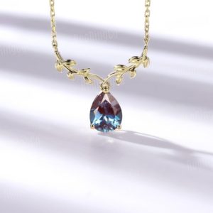 Shop Alexandrite Necklaces! Pear cut Alexandrite Necklace leaf 14k yellow gold pendant bridal anniversary necklace unique necklace vintage alexandrite necklace | Natural genuine Alexandrite necklaces. Buy handcrafted artisan wedding jewelry.  Unique handmade bridal jewelry gift ideas. #jewelry #beadednecklaces #gift #crystaljewelry #shopping #handmadejewelry #wedding #bridal #necklaces #affiliate #ad