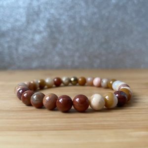 Shop Petrified Wood Bracelets! Petrified Wood Crystal Bracelet (6mm) | Handmade in Canada | Natural genuine Petrified Wood bracelets. Buy crystal jewelry, handmade handcrafted artisan jewelry for women.  Unique handmade gift ideas. #jewelry #beadedbracelets #beadedjewelry #gift #shopping #handmadejewelry #fashion #style #product #bracelets #affiliate #ad