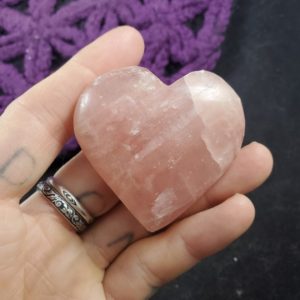 Shop Pink Calcite Stones & Crystals! Rose Pink Calcite Heart Crystals Magick Stones New Find Starseed polished Carving Pakistan Carved Heart Shaped Rock | Natural genuine stones & crystals in various shapes & sizes. Buy raw cut, tumbled, or polished gemstones for making jewelry or crystal healing energy vibration raising reiki stones. #crystals #gemstones #crystalhealing #crystalsandgemstones #energyhealing #affiliate #ad