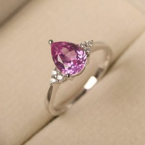 Shop Pink Sapphire Rings! Pink sapphire wedding ring, water drop shaped, solid sterling silver, hot pink gemstone,unique daily ring | Natural genuine Pink Sapphire rings, simple unique alternative gemstone engagement rings. #rings #jewelry #bridal #wedding #jewelryaccessories #engagementrings #weddingideas #affiliate #ad