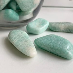 Shop Tumbled Amazonite Crystals & Pocket Stones! Polished amazonite, bulk amazonite tumbles, green rocks, pretty rocks | Natural genuine stones & crystals in various shapes & sizes. Buy raw cut, tumbled, or polished gemstones for making jewelry or crystal healing energy vibration raising reiki stones. #crystals #gemstones #crystalhealing #crystalsandgemstones #energyhealing #affiliate #ad