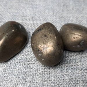 Shop Tumbled Pyrite Crystals & Pocket Stones! Pyrite Tumbled Stone | Pyrite Crystal | Protection Crystal | Fools Gold | Tumble Stone | Natural genuine stones & crystals in various shapes & sizes. Buy raw cut, tumbled, or polished gemstones for making jewelry or crystal healing energy vibration raising reiki stones. #crystals #gemstones #crystalhealing #crystalsandgemstones #energyhealing #affiliate #ad