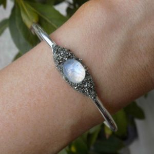 Shop Rainbow Moonstone Bracelets! Rainbow Moonstone Bracelet, June Birthstone Bracelet, Flashy Blue Moonstone Jewelry, Oval Gemstone Cuff, Beautiful Gift, Beautiful Jewelry | Natural genuine Rainbow Moonstone bracelets. Buy crystal jewelry, handmade handcrafted artisan jewelry for women.  Unique handmade gift ideas. #jewelry #beadedbracelets #beadedjewelry #gift #shopping #handmadejewelry #fashion #style #product #bracelets #affiliate #ad