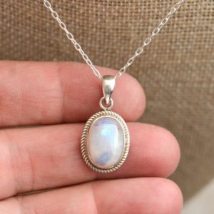 Shop Rainbow Moonstone Necklaces! Rainbow Moonstone Necklace, Sterling Silver, Oval Rainbow Moonstone Pendant, June Birthstone, Traditional Nepal, Birthday Gift, BID18-1222O | Natural genuine Rainbow Moonstone necklaces. Buy crystal jewelry, handmade handcrafted artisan jewelry for women.  Unique handmade gift ideas. #jewelry #beadednecklaces #beadedjewelry #gift #shopping #handmadejewelry #fashion #style #product #necklaces #affiliate #ad