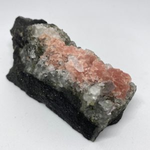 Shop Raw & Rough Rhodonite Stones! Raw Rhodonite Pork Stone Specimen Reiki-Charged | Natural genuine stones & crystals in various shapes & sizes. Buy raw cut, tumbled, or polished gemstones for making jewelry or crystal healing energy vibration raising reiki stones. #crystals #gemstones #crystalhealing #crystalsandgemstones #energyhealing #affiliate #ad