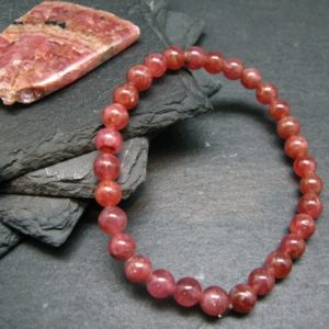 Shop Rhodochrosite Bracelets! Rhodochrosite Genuine Bracelet ~ 7 Inches  ~ 7mm Round Beads | Natural genuine Rhodochrosite bracelets. Buy crystal jewelry, handmade handcrafted artisan jewelry for women.  Unique handmade gift ideas. #jewelry #beadedbracelets #beadedjewelry #gift #shopping #handmadejewelry #fashion #style #product #bracelets #affiliate #ad
