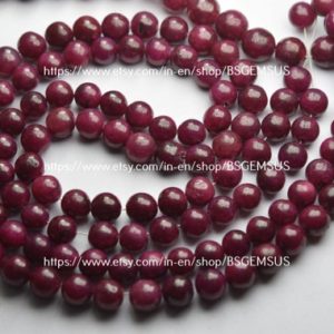 Shop Ruby Round Beads! 8 Inches Strand, Natural Dyed Ruby Smooth Round Balls Beads,Size 6-6.5mm Approx | Natural genuine round Ruby beads for beading and jewelry making.  #jewelry #beads #beadedjewelry #diyjewelry #jewelrymaking #beadstore #beading #affiliate #ad