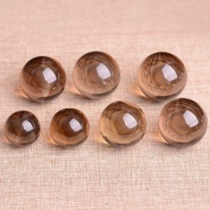 Shop Smoky Quartz Shapes! Natural Smoky Quartz Ball Smoky Quartz Sphere Crystal Sphere About 20mm 30mm Healing Crystal Wholesale | Natural genuine stones & crystals in various shapes & sizes. Buy raw cut, tumbled, or polished gemstones for making jewelry or crystal healing energy vibration raising reiki stones. #crystals #gemstones #crystalhealing #crystalsandgemstones #energyhealing #affiliate #ad