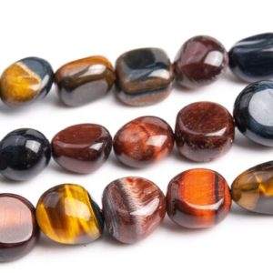 Shop Tiger Eye Chip & Nugget Beads! 8-10MM Yellow Red Blue Tiger Eye Beads Pebble Nugget Grade AA Genuine Natural Gemstone Loose Beads 15" /7.5" Bulk Lot Options (108562) | Natural genuine chip Tiger Eye beads for beading and jewelry making.  #jewelry #beads #beadedjewelry #diyjewelry #jewelrymaking #beadstore #beading #affiliate #ad