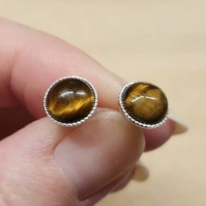 Tiger's eye Stud earrings. 925 sterling silver. Post earrings. Reiki jewelry uk. Capricorn jewelry. 8mm stone | Natural genuine Tiger Eye earrings. Buy crystal jewelry, handmade handcrafted artisan jewelry for women.  Unique handmade gift ideas. #jewelry #beadedearrings #beadedjewelry #gift #shopping #handmadejewelry #fashion #style #product #earrings #affiliate #ad