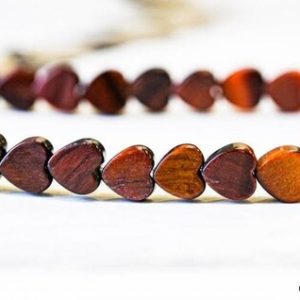 Shop Tiger Eye Bead Shapes! M/ Red Tiger Eye 8mm/ 6mm Heart Beads 15.5" strand Enhanced Red Brownish gemstone beads Good Cut, Good For Earring, Charms, Jewelry Use | Natural genuine other-shape Tiger Eye beads for beading and jewelry making.  #jewelry #beads #beadedjewelry #diyjewelry #jewelrymaking #beadstore #beading #affiliate #ad