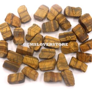 Shop Raw & Rough Tiger Eye Stones! 10 Piece Increases Their Vigor Rough Size 18-20 MM Loose Gemstone AAA Grade Quality Natural Tiger eye Gemstone Rough Natural Gems Crystal | Natural genuine stones & crystals in various shapes & sizes. Buy raw cut, tumbled, or polished gemstones for making jewelry or crystal healing energy vibration raising reiki stones. #crystals #gemstones #crystalhealing #crystalsandgemstones #energyhealing #affiliate #ad