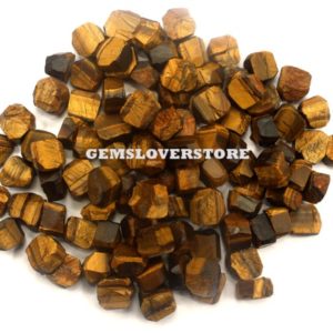 Shop Raw & Rough Tiger Eye Stones! 25 Pieces Raw Tiger's Eye Chunk Size 10-12 MM Chatoyant Stone  Rough Natural Tiger Eye Rough Stone is Specifically beneficial for shy people | Natural genuine stones & crystals in various shapes & sizes. Buy raw cut, tumbled, or polished gemstones for making jewelry or crystal healing energy vibration raising reiki stones. #crystals #gemstones #crystalhealing #crystalsandgemstones #energyhealing #affiliate #ad