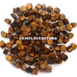 Shop Raw & Rough Tiger Eye Stones! 50 Piece Natural Tiger Eye Raw Size 6-8 MM Rough Protection Crystals Gemstone, Natural Tiger Eye Gemstone Raw Small Tigers Eye Rough Stone | Natural genuine stones & crystals in various shapes & sizes. Buy raw cut, tumbled, or polished gemstones for making jewelry or crystal healing energy vibration raising reiki stones. #crystals #gemstones #crystalhealing #crystalsandgemstones #energyhealing #affiliate #ad