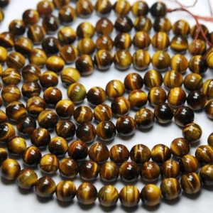 Shop Tiger Eye Round Beads! 10 Inch Strand,Natural Tiger Eye Smooth Round Balls Beads Shape,Size 8mm | Natural genuine round Tiger Eye beads for beading and jewelry making.  #jewelry #beads #beadedjewelry #diyjewelry #jewelrymaking #beadstore #beading #affiliate #ad