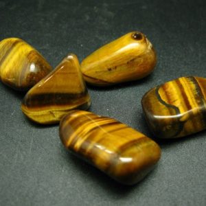 Shop Tumbled Tiger Eye Crystals & Pocket Stones! Lot of 5 Large Natural Tumbled Tiger Eye Stones  from Brazil | Natural genuine stones & crystals in various shapes & sizes. Buy raw cut, tumbled, or polished gemstones for making jewelry or crystal healing energy vibration raising reiki stones. #crystals #gemstones #crystalhealing #crystalsandgemstones #energyhealing #affiliate #ad
