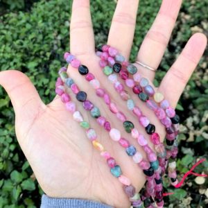Shop Tourmaline Chip & Nugget Beads! 1 Strand/15" Natural Multi-Color Tourmaline Healing Gemstone 6mm to 8mm Free Form Oval Tumbled Pebble Stone Bead for Earrings Jewelry Making | Natural genuine chip Tourmaline beads for beading and jewelry making.  #jewelry #beads #beadedjewelry #diyjewelry #jewelrymaking #beadstore #beading #affiliate #ad