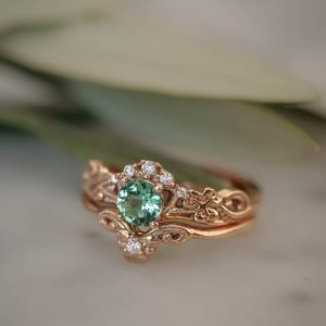 Shop Tourmaline Jewelry! Clover leaf ring, rose gold bridal ring set, mint tourmaline ring, nature engagement ring, leaf engagement ring, leaves ring, stacking rings | Natural genuine Tourmaline jewelry. Buy handcrafted artisan wedding jewelry.  Unique handmade bridal jewelry gift ideas. #jewelry #beadedjewelry #gift #crystaljewelry #shopping #handmadejewelry #wedding #bridal #jewelry #affiliate #ad