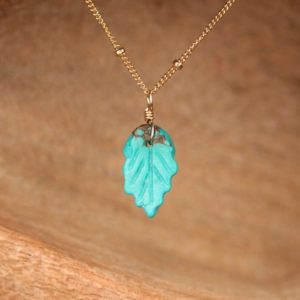 Shop Turquoise Jewelry! Turquoise leaf necklace – natural turquoise necklace – a wire wrapped hand carved turquoise leaf on a 14k gold filled satellite chain leaf | Natural genuine Turquoise jewelry. Buy crystal jewelry, handmade handcrafted artisan jewelry for women.  Unique handmade gift ideas. #jewelry #beadedjewelry #beadedjewelry #gift #shopping #handmadejewelry #fashion #style #product #jewelry #affiliate #ad