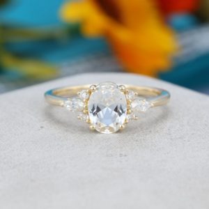 Oval white sapphire engagement ring yellow gold Unique Cluster engagement ring vintage Marquise diamond wedding Bridal Anniversary gift | Natural genuine Gemstone rings, simple unique alternative gemstone engagement rings. #rings #jewelry #bridal #wedding #jewelryaccessories #engagementrings #weddingideas #affiliate #ad