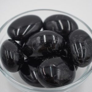 Shop Tumbled Tourmaline Crystals & Pocket Stones! XL Black Tourmaline Tumbled Stone | Natural genuine stones & crystals in various shapes & sizes. Buy raw cut, tumbled, or polished gemstones for making jewelry or crystal healing energy vibration raising reiki stones. #crystals #gemstones #crystalhealing #crystalsandgemstones #energyhealing #affiliate #ad