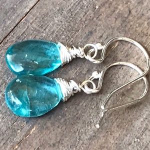 Neon Blue earrings, natural Apatite Gemstone sterling silver dangles, gemstone teardrops, sky blue drops. | Natural genuine Apatite earrings. Buy crystal jewelry, handmade handcrafted artisan jewelry for women.  Unique handmade gift ideas. #jewelry #beadedearrings #beadedjewelry #gift #shopping #handmadejewelry #fashion #style #product #earrings #affiliate #ad