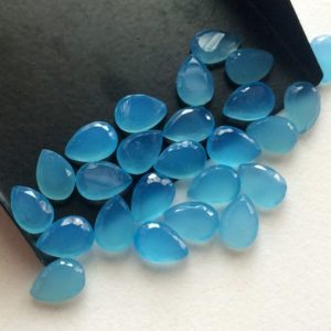 Shop Blue Chalcedony Stones & Crystals! 7x10mm Blue Chalcedony Pear Table Cut Flat Back,Blue Chalcedony Pear Cabochons For Jewelry, Blue Chalcedony Gemstone (5Pcs to 25Pcs Options) | Natural genuine stones & crystals in various shapes & sizes. Buy raw cut, tumbled, or polished gemstones for making jewelry or crystal healing energy vibration raising reiki stones. #crystals #gemstones #crystalhealing #crystalsandgemstones #energyhealing #affiliate #ad