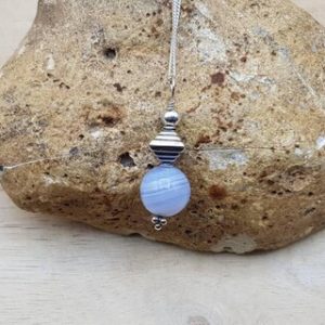 Shop Blue Lace Agate Pendants! Small Blue lace agate pendant necklace. Minimalist Reiki jewelry uk. Pisces jewelry. Bali silver sphere necklace. | Natural genuine Blue Lace Agate pendants. Buy crystal jewelry, handmade handcrafted artisan jewelry for women.  Unique handmade gift ideas. #jewelry #beadedpendants #beadedjewelry #gift #shopping #handmadejewelry #fashion #style #product #pendants #affiliate #ad