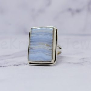 Shop Blue Lace Agate Rings! Blue Lace Agate Ring, 925 Sterling Silver Ring, Cushion Gemstone Ring, Cabochon Gemstone, Handmade Ring, Statement Ring, Split Band Ring | Natural genuine Blue Lace Agate rings, simple unique handcrafted gemstone rings. #rings #jewelry #shopping #gift #handmade #fashion #style #affiliate #ad