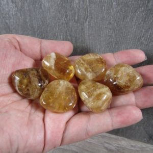 Shop Calcite Stones & Crystals! Honey Calcite Tumbled Stone 3/4 inch + T524 | Natural genuine stones & crystals in various shapes & sizes. Buy raw cut, tumbled, or polished gemstones for making jewelry or crystal healing energy vibration raising reiki stones. #crystals #gemstones #crystalhealing #crystalsandgemstones #energyhealing #affiliate #ad