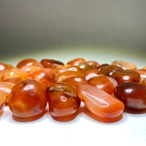Shop Tumbled Carnelian Crystals & Pocket Stones! Carnelian Tumbled Stones from India | Natural genuine stones & crystals in various shapes & sizes. Buy raw cut, tumbled, or polished gemstones for making jewelry or crystal healing energy vibration raising reiki stones. #crystals #gemstones #crystalhealing #crystalsandgemstones #energyhealing #affiliate #ad