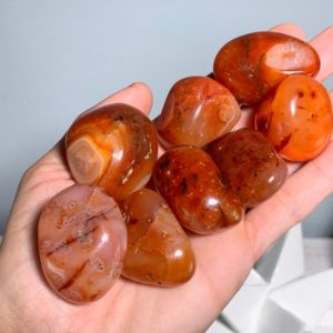 Shop Tumbled Carnelian Crystals & Pocket Stones! XL Carnelian, Tumbled Carnelian, Chalcedony Variety, Red Chalcedony, Orange Chalcedony | Natural genuine stones & crystals in various shapes & sizes. Buy raw cut, tumbled, or polished gemstones for making jewelry or crystal healing energy vibration raising reiki stones. #crystals #gemstones #crystalhealing #crystalsandgemstones #energyhealing #affiliate #ad