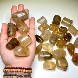 Shop Tumbled Citrine Crystals & Pocket Stones! Natural Citrine Tumbled Stones | Natural genuine stones & crystals in various shapes & sizes. Buy raw cut, tumbled, or polished gemstones for making jewelry or crystal healing energy vibration raising reiki stones. #crystals #gemstones #crystalhealing #crystalsandgemstones #energyhealing #affiliate #ad