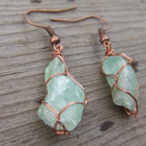 emerald green calcite crystals raw and natural pure copper wire wrapped earrings rough pure color | Natural genuine Gemstone jewelry. Buy crystal jewelry, handmade handcrafted artisan jewelry for women.  Unique handmade gift ideas. #jewelry #beadedjewelry #beadedjewelry #gift #shopping #handmadejewelry #fashion #style #product #jewelry #affiliate #ad