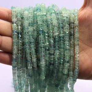 Shop Fluorite Rondelle Beads! Green Fluorite Faceted Rondelle Beads Shaded Green Fluorite Beads Natural Fluorite Rondelle Faceted Beads for Handmade Jewelry Making Craft | Natural genuine rondelle Fluorite beads for beading and jewelry making.  #jewelry #beads #beadedjewelry #diyjewelry #jewelrymaking #beadstore #beading #affiliate #ad