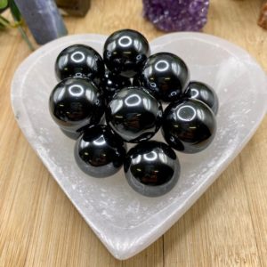Shop Hematite Shapes! Magnetic Hematite spheres – pair! | Natural genuine stones & crystals in various shapes & sizes. Buy raw cut, tumbled, or polished gemstones for making jewelry or crystal healing energy vibration raising reiki stones. #crystals #gemstones #crystalhealing #crystalsandgemstones #energyhealing #affiliate #ad