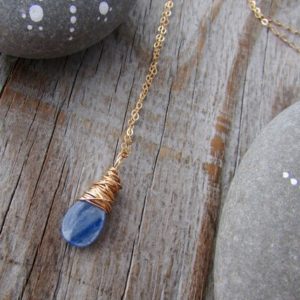 Shop Kyanite Pendants! Kyanite Pendant necklace, small, simple, gold, wire wrapped gemstone pendant | Natural genuine Kyanite pendants. Buy crystal jewelry, handmade handcrafted artisan jewelry for women.  Unique handmade gift ideas. #jewelry #beadedpendants #beadedjewelry #gift #shopping #handmadejewelry #fashion #style #product #pendants #affiliate #ad