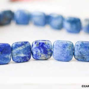 Shop Lapis Lazuli Bead Shapes! L/ Denim Lapis 14x14mm/ 16x16mm Flat Square Beads 16" Strand Natural blue gemstone beads Blue shade varies For jewelry making | Natural genuine other-shape Lapis Lazuli beads for beading and jewelry making.  #jewelry #beads #beadedjewelry #diyjewelry #jewelrymaking #beadstore #beading #affiliate #ad